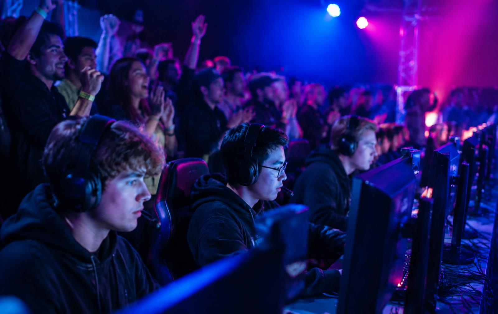Players competing at a community gaming tournament